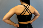 THIS IS WAR DOUBLE CROSSBACK SPORTS BRA
